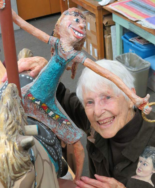 Leata with one of her many paper mache sculptures.